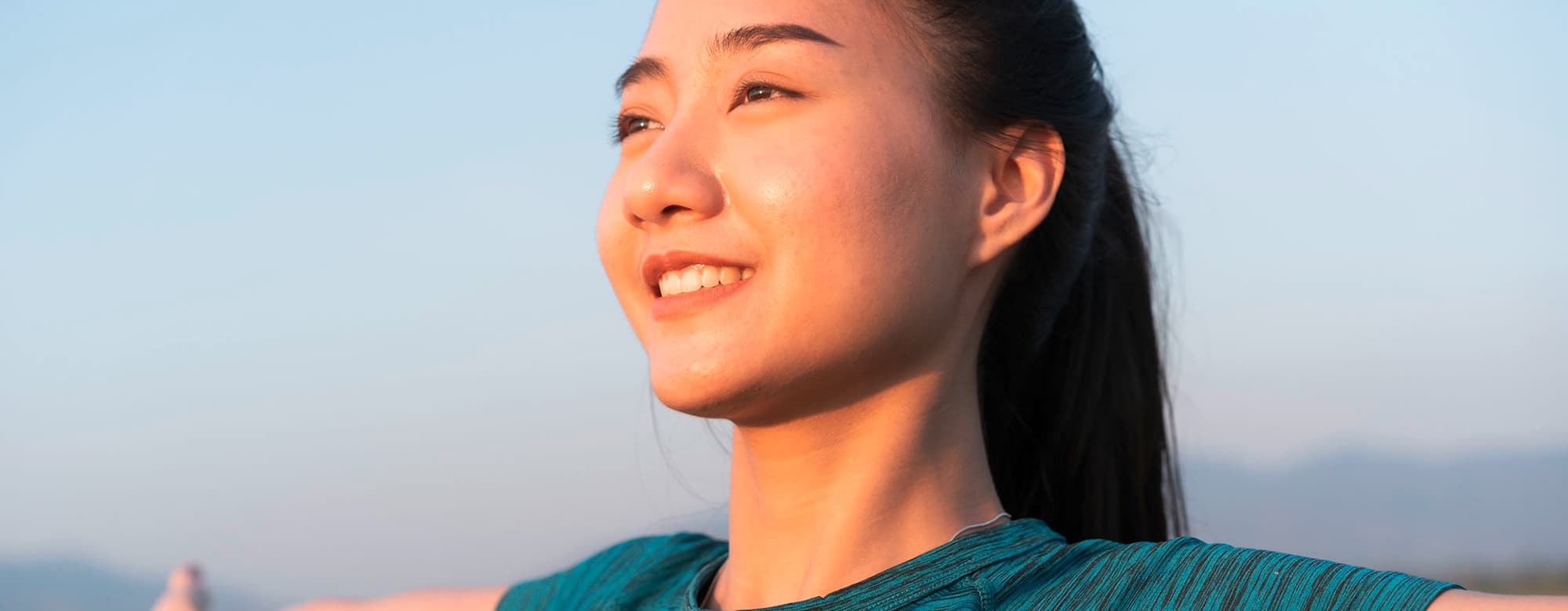 a healthy woman exercising outdoor