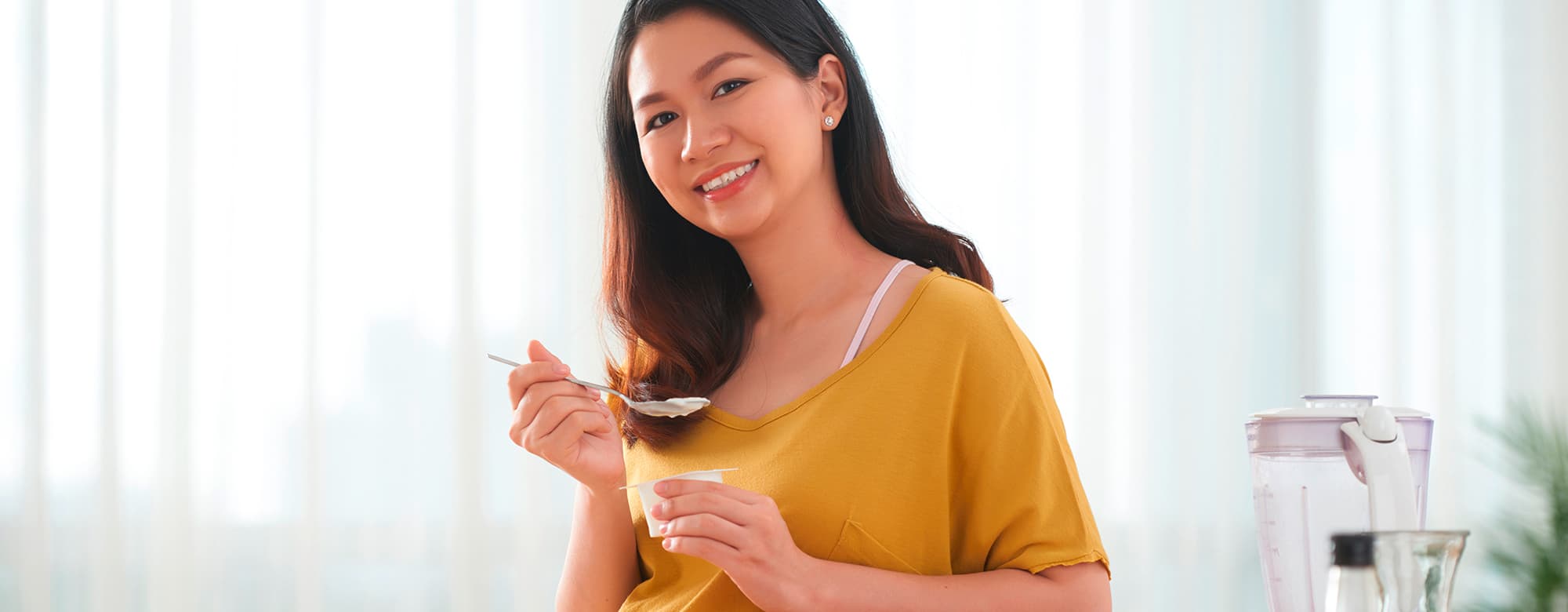 a pregnant woman eating a nutritious food