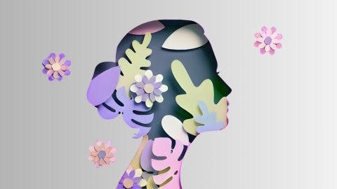 International Womens Day poster with woman silhouette and floral ornaments in paper cut 3D illustration